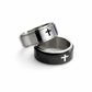Two rings with cross designs on a white background