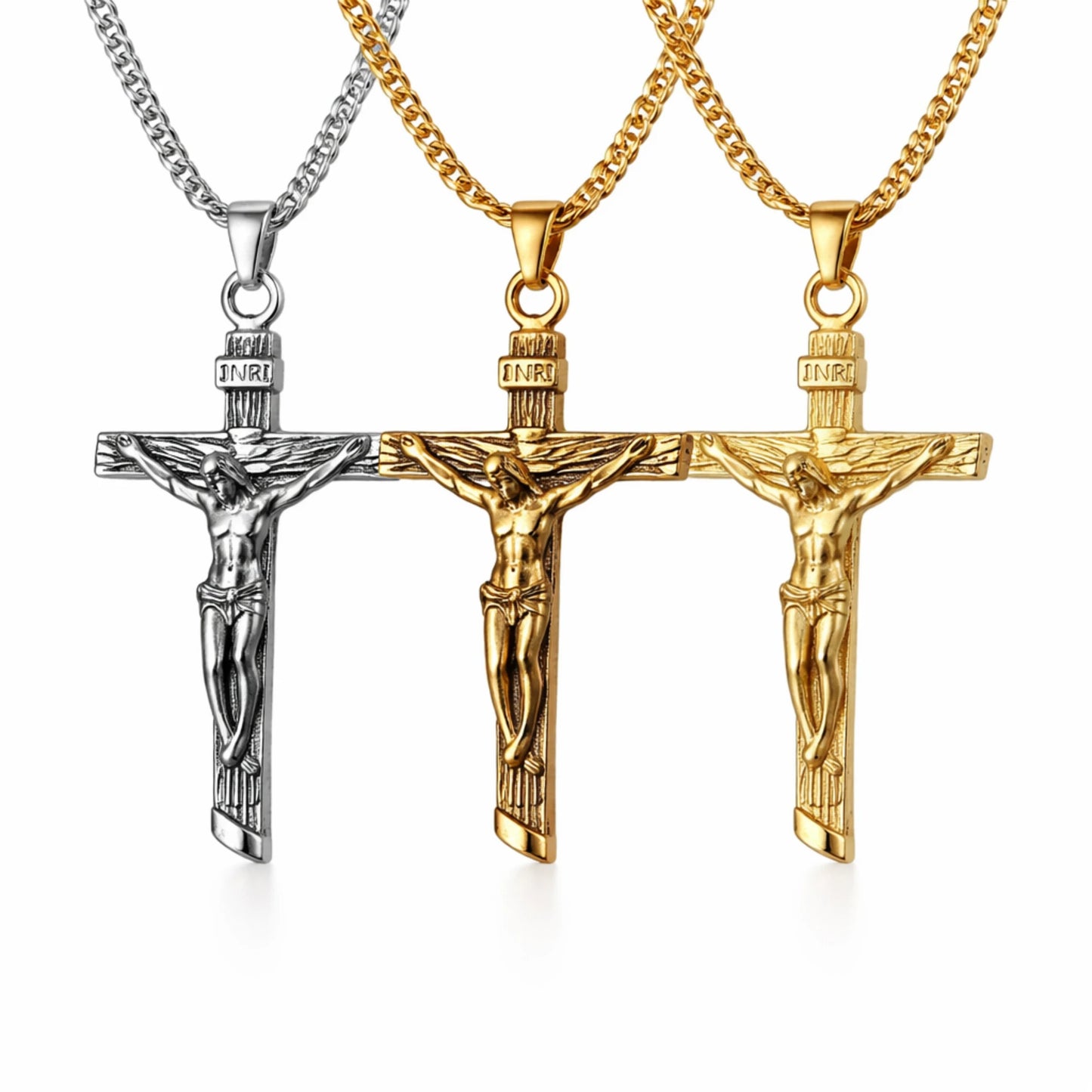 Three crucifix pendants in silver, gold, and rose gold on white background
