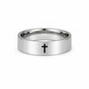 Silver ring with a black cross on a white background