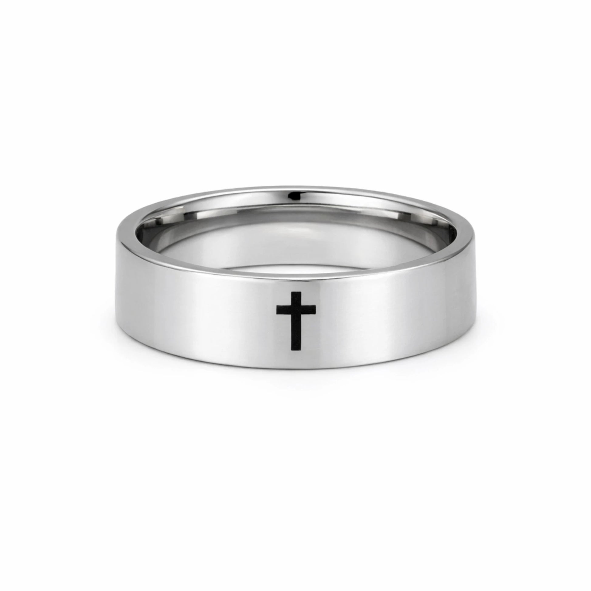 Silver ring with a black cross on a white background