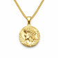 Gold necklace with a pendant featuring a face design on a white background