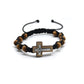 Bracelet with wooden beads and a cross charm on a white background